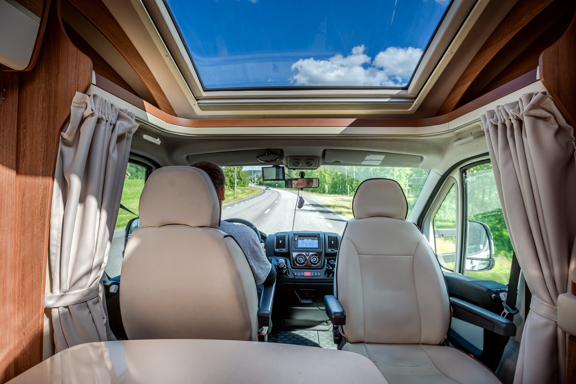 Rent a Camper Van in Morocco | Airport Transfers | Jl Autocaravana man-driving-on-a-road-in-the-camper-van-rv.jpg