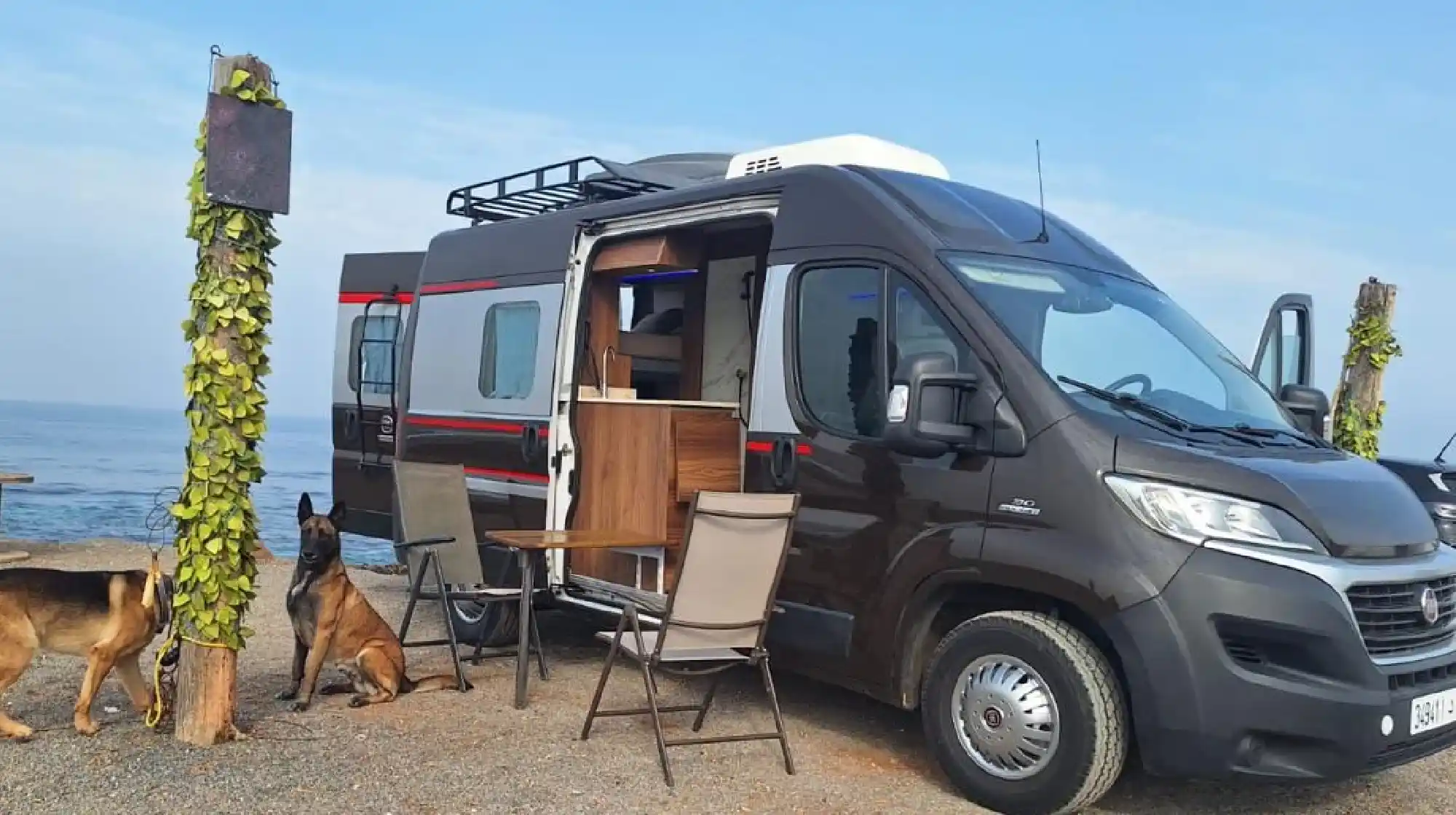 Rent a Camper Van in Morocco | Airport Transfers | Über Camping-car garé face à la mer au Maroc